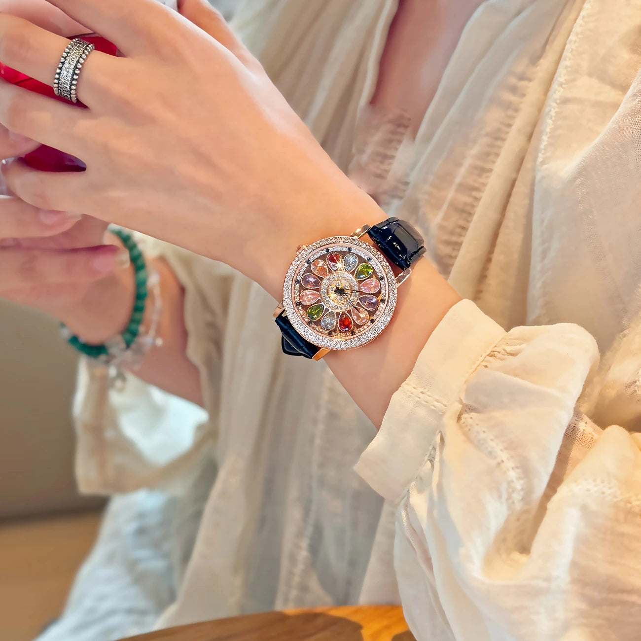 Fashionable Quartz Wrist Watch for Women with Colorful Rhinestone Embellishments, Rotating Dial, Alloy Case, and Durable PU Leather Strap